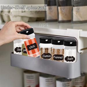 Wall-mounted under-shelf spice rack with pull-out compartment for organizing up to seven spice jars, featuring durable food-grade materials and drill-free 3M adhesive installation for modern kitchens.