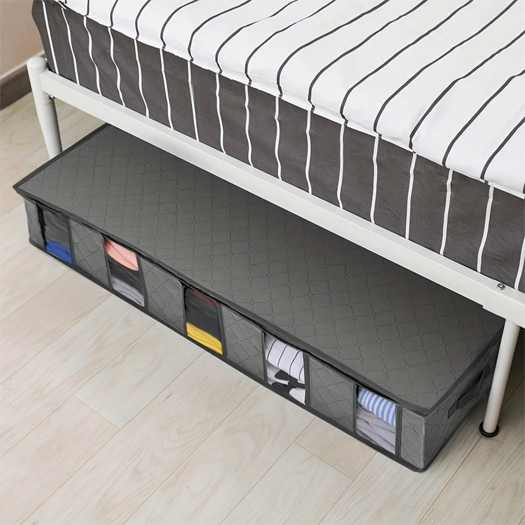 Large capacity under bed storage organizer used for neatly storing quilts, blankets, clothes, and other items, maximizing space and keeping belongings protected and organized.